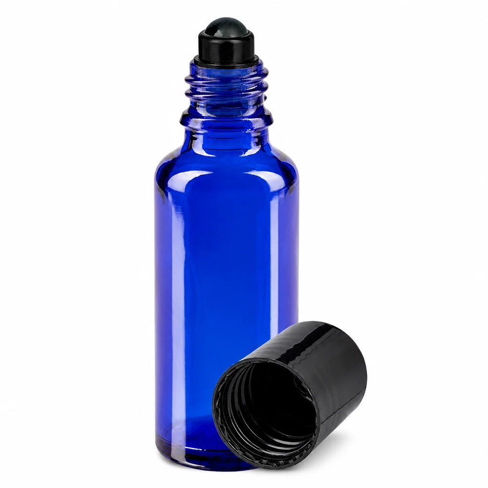 Apteekkipullo sininen 30ml roll-on korkki musta 30 ml:n sininen lasipullo, jossa on musta rullasovitin ja kierrekorkki eteerisille öljyille