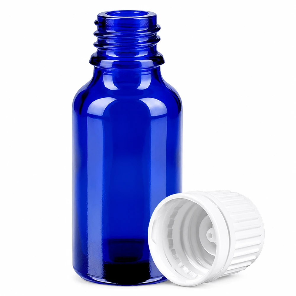Pieni 20 ml:n pullo sinistä lasia, jossa on valkoinen korkki tarkkaa annostelua ja säilytystä varten.