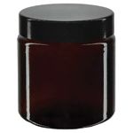 Ruskeat lasipurkit mustalla kannella