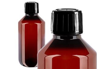 Ruskeat PET-lääkepullot mustalla suihkukorkilla