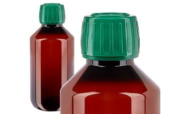 Ruskeat PET-lääkepullot vihreällä korkilla