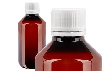 Ruskeat PET-lääkepullot valkoisella korkilla