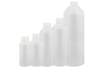 Valkoiset sylinterimäiset pullot ilman korkkia